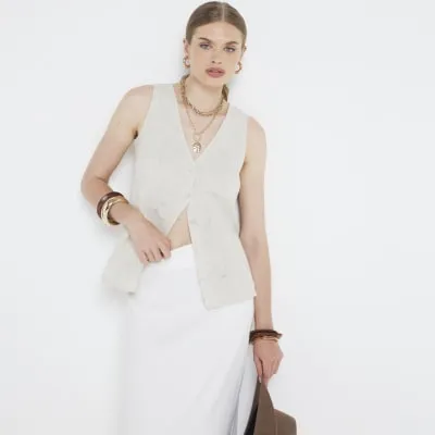 Beige linen blend embroidered waistcoat sold by River Island