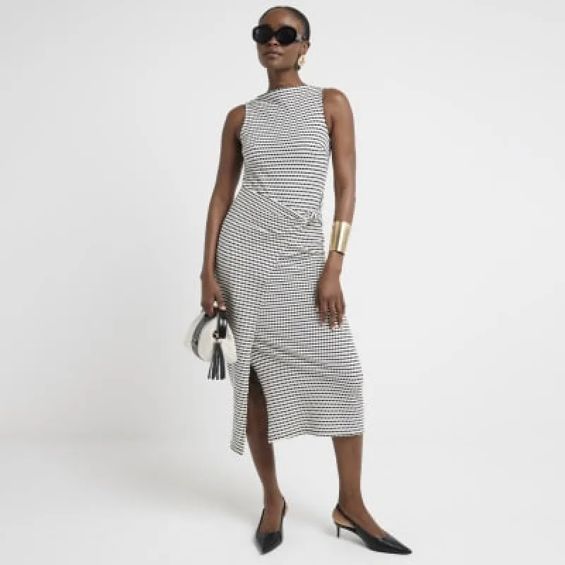 Cream textured stripe knot bodycon midi dress sold by River Island
