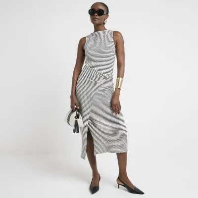 Cream textured stripe knot bodycon midi dress sold by River Island