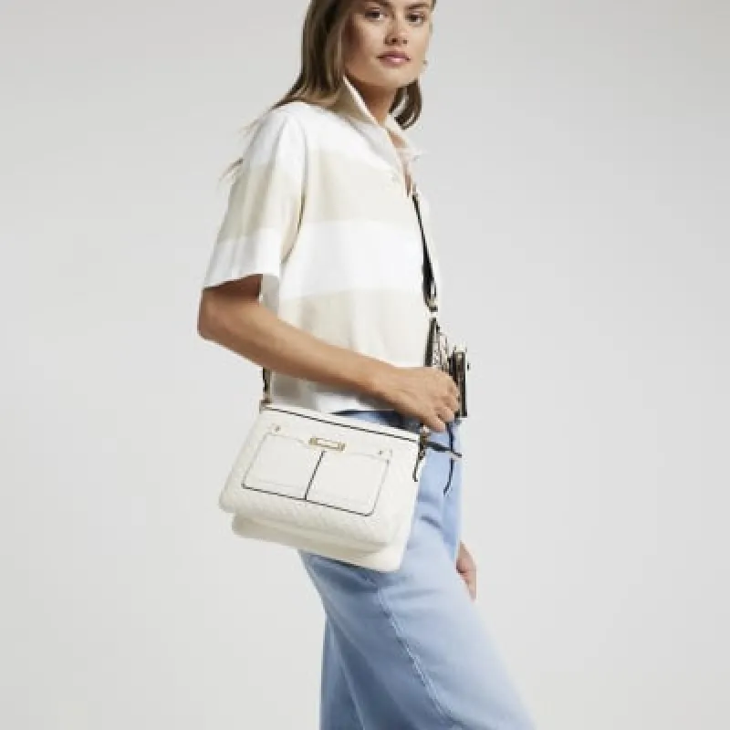 Cream Monogram cross Body bag sold by River Island