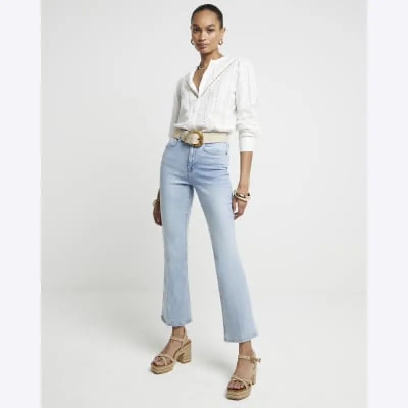 Blue high waisted flared crop jeans sold by River Island