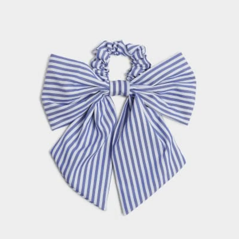 Blue stripe bow hair band sold by River Island