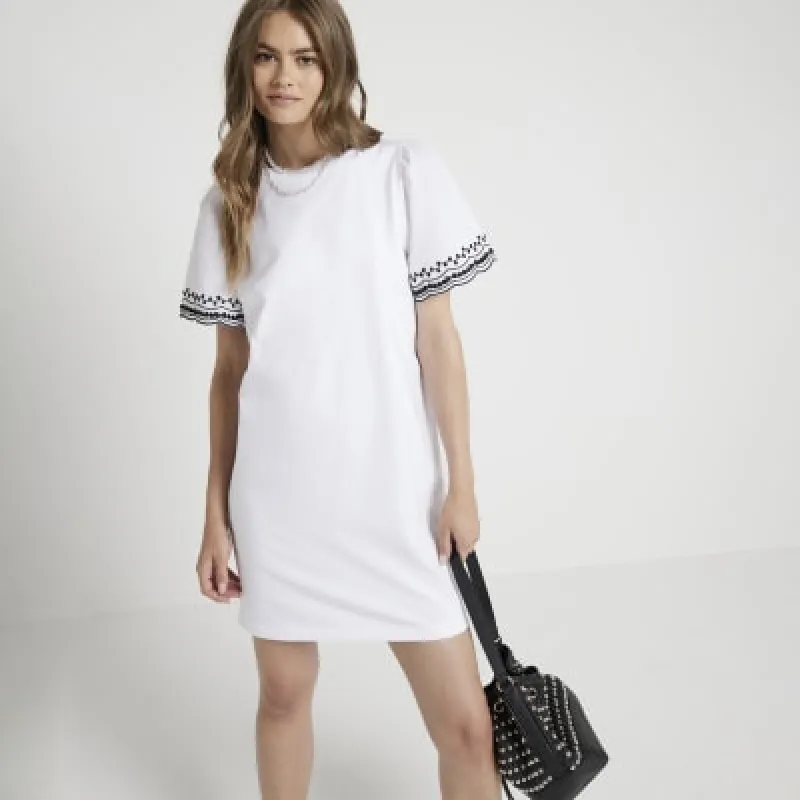 White embroidered sleeve t-shirt mini dress sold by River Island