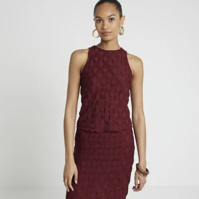 Red textured sleeveless top sold by River Island