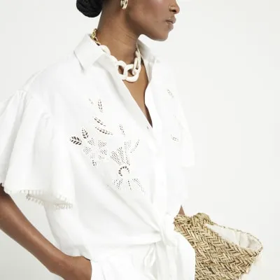 White broderie tie up shirt sold by River Island
