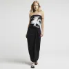 Black graphic floral print bandeau sold by River Island