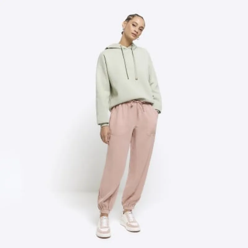 Pink lyocell cuffed joggers sold by River Island