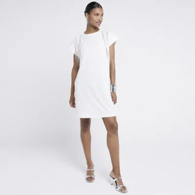 White fringe detail t-shirt mini dress sold by River Island