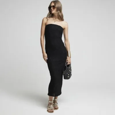 Black texture bandeau midi dress sold by River Island