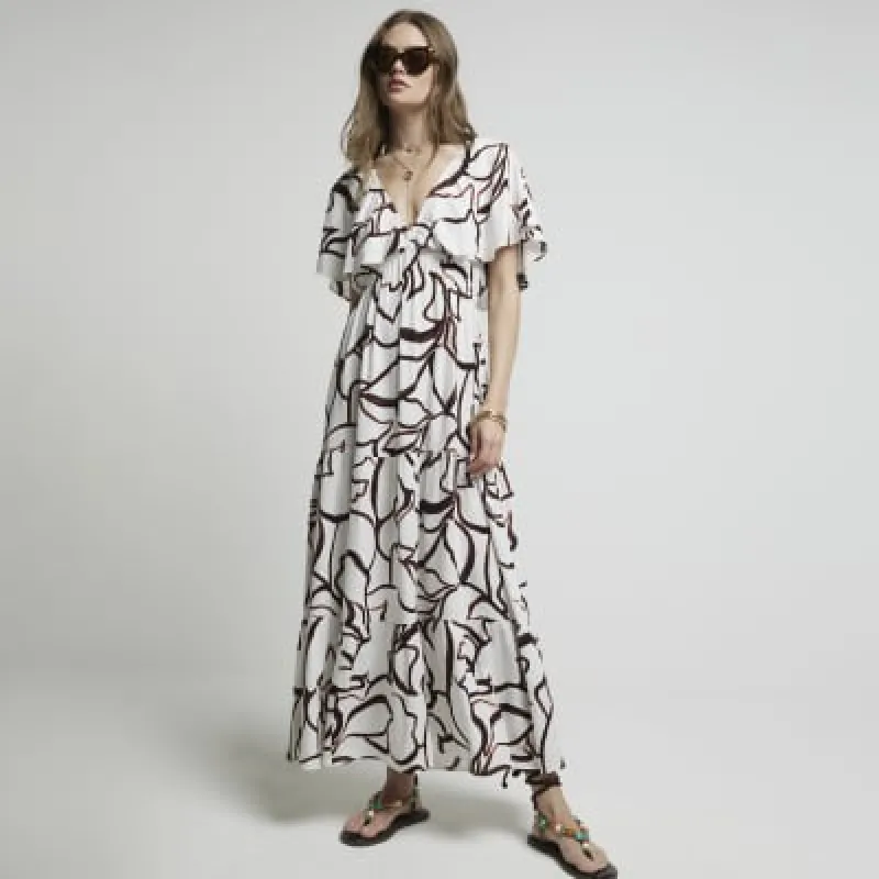 Brown abstract frill sleeve smock maxi dress sold by River Island