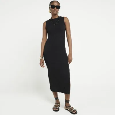 Black crochet open back bodycon midi dress sold by River Island