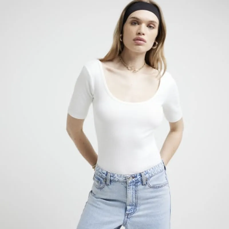 Cream ribbed scoop neck bodysuit sold by River Island