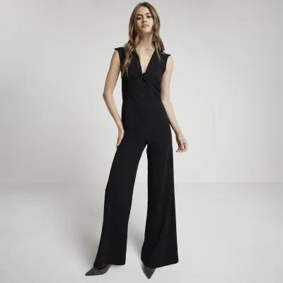 Black twist front plunge jumpsuit sold by River Island