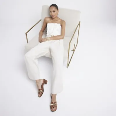 Brown leather cut out heeled sandals sold by River Island