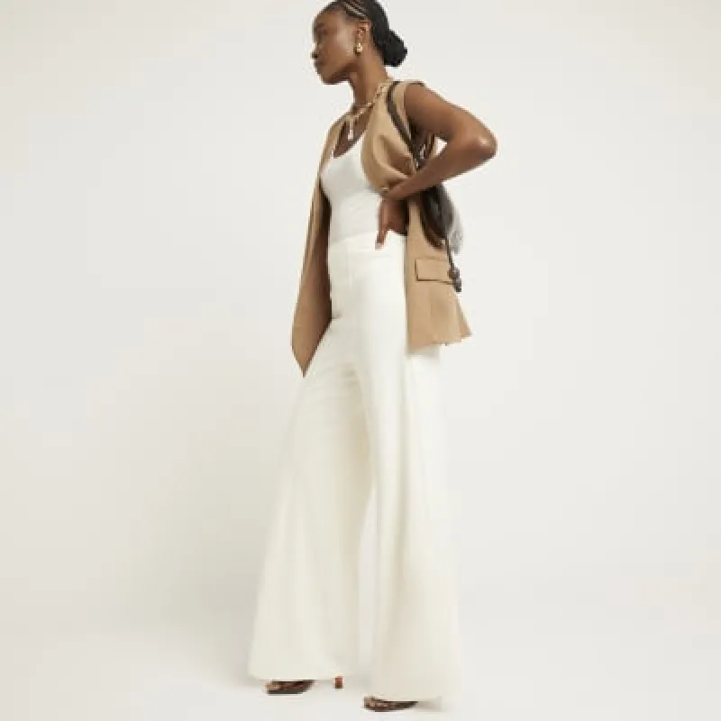 Cream Wide Leg Smart Trousers sold by River Island