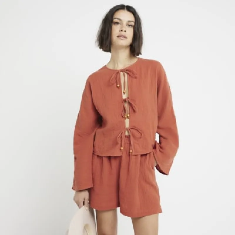 Rust textured tie front top sold by River Island