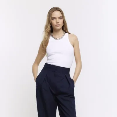 White ribbed racer vest top sold by River Island