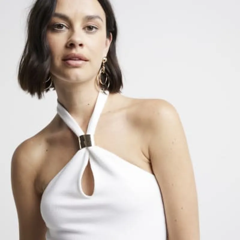 Cream hardware halter neck top sold by River Island
