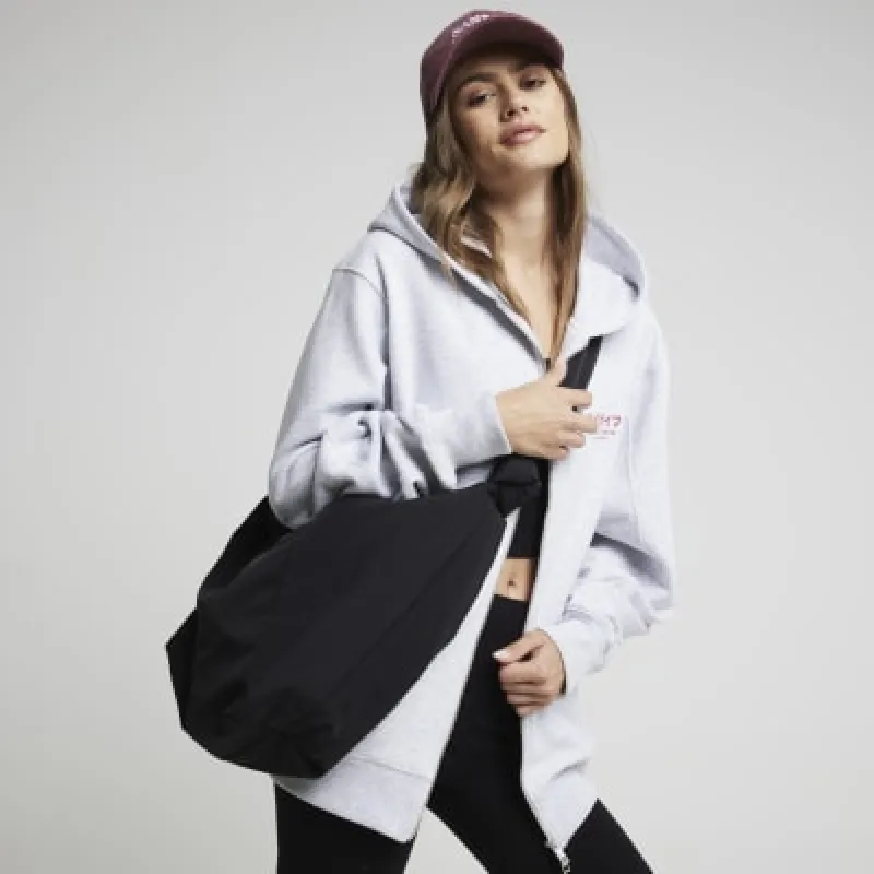 Black knot scoop cross body bag sold by River Island