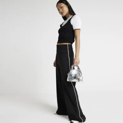 Petite Black Taped Wide Leg Trousers sold by River Island