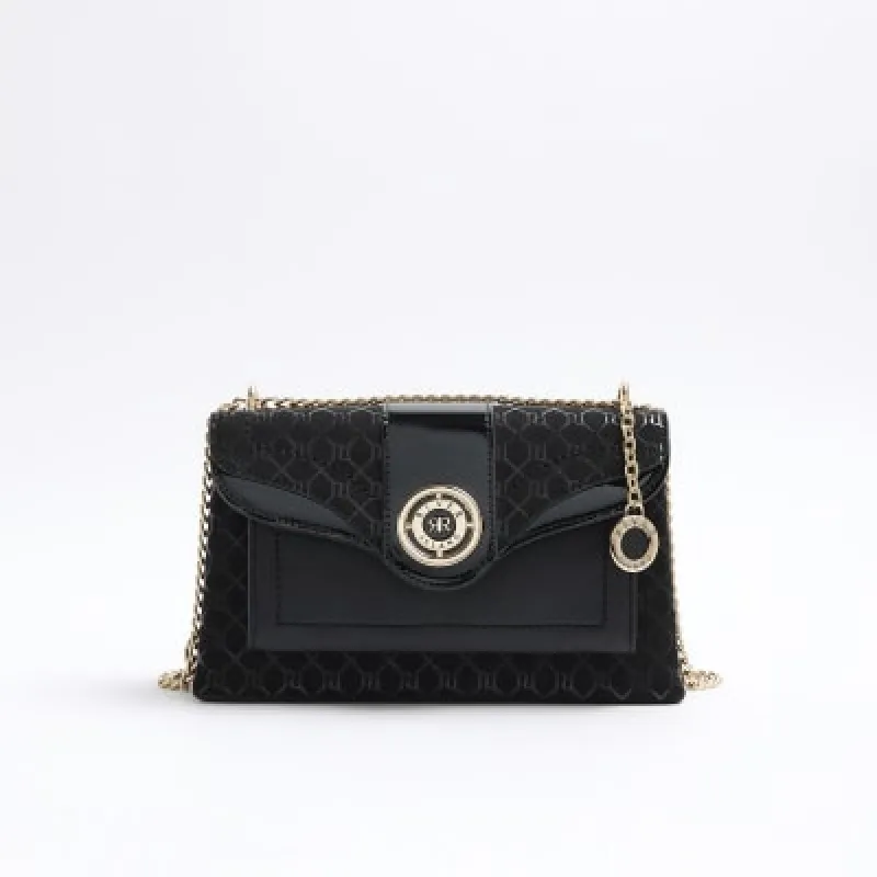 Black RI monogram chain shoulder bag sold by River Island