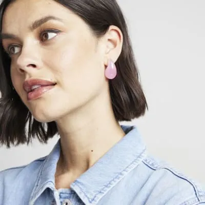 Pink domed earrings sold by River Island
