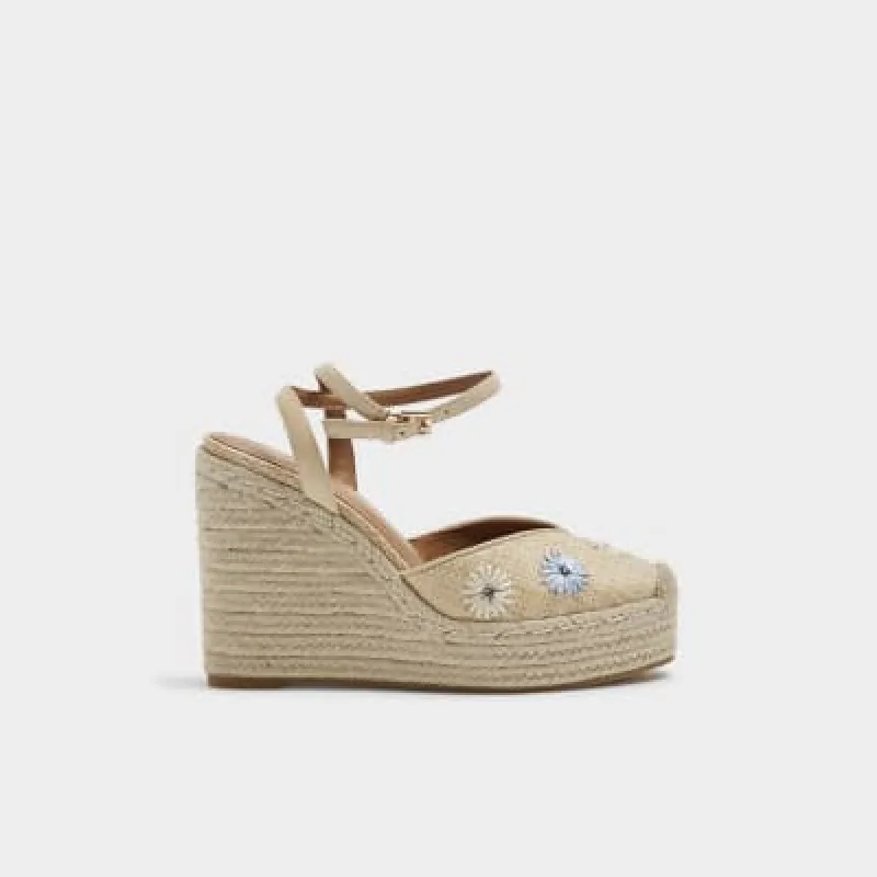 Beige embroidered espadrille wedge sandals sold by River Island