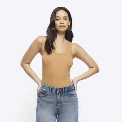 Brown scoop neck vest top sold by River Island