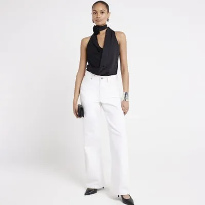 Black wrap drape top sold by River Island