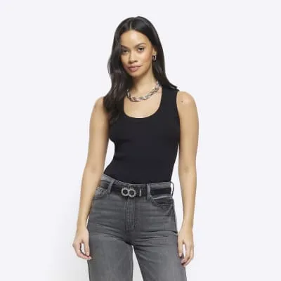 Black scoop neck vest top sold by River Island