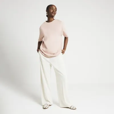 Pink oversized plain t-shirt sold by River Island
