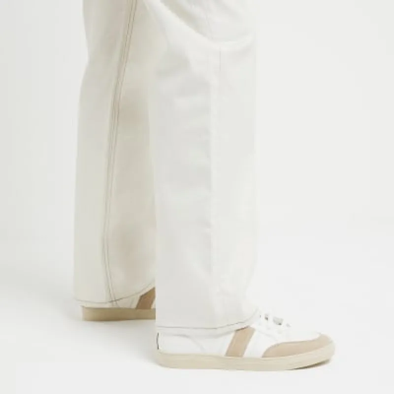 White leather lace up trainers sold by River Island