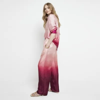 Pink satin ombre wide leg trousers sold by River Island