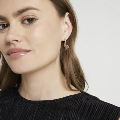 Rose Gold Butterfly Stud Earrings sold by River Island
