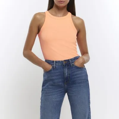 Orange ribbed racer vest top sold by River Island