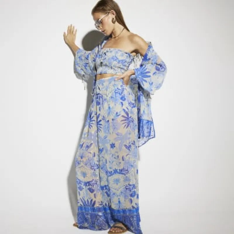 Blue floral chiffon beach trousers sold by River Island