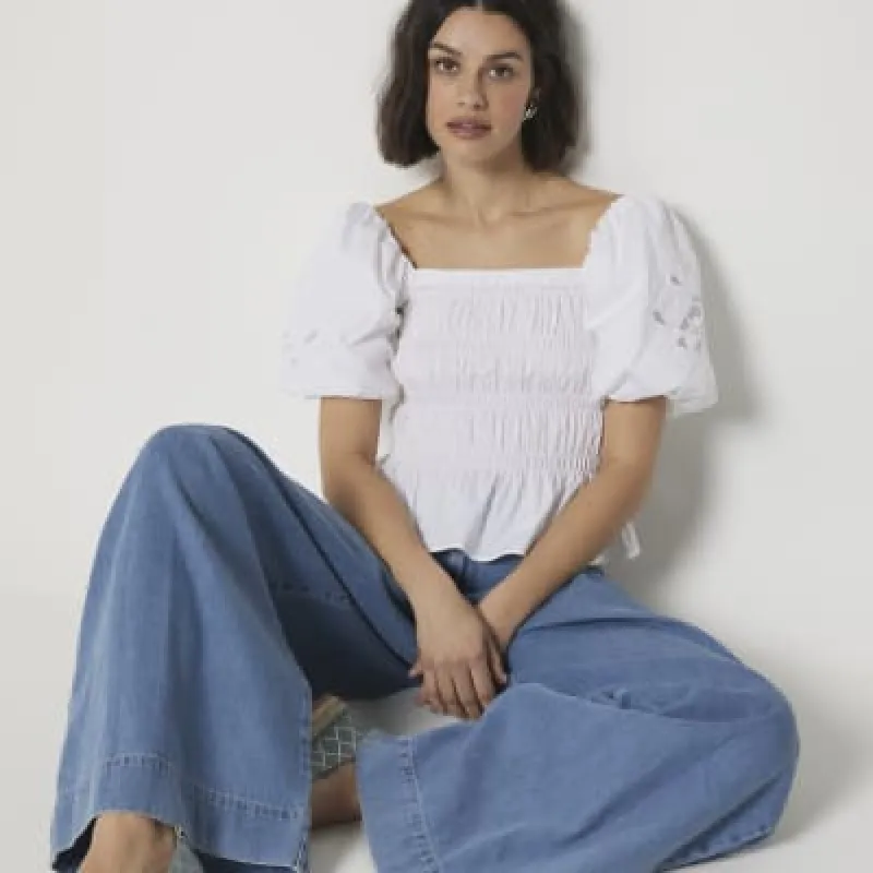 White shirred cut out puff sleeve blouse sold by River Island