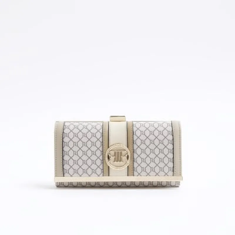 Beige monogram clip top purse sold by River Island