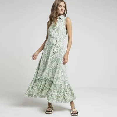 Green belted sleeveless midi shirt dress sold by River Island