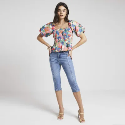 Pink floral shirred puff sleeve blouse sold by River Island