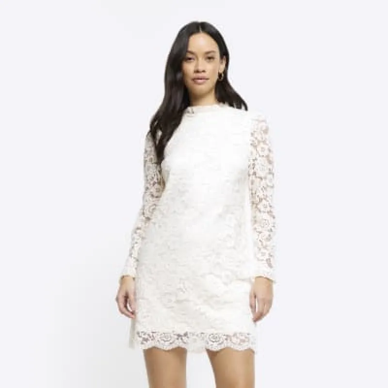 Cream lace shift mini dress sold by River Island