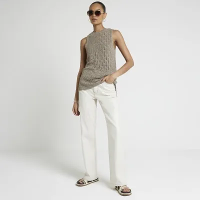 Beige knitted tank top sold by River Island