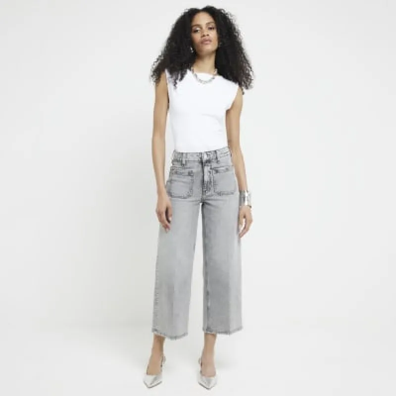 Grey high waisted cropped wide fit jeans sold by River Island