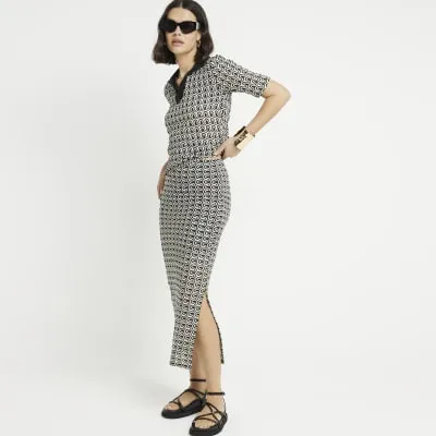 Black crochet geometric midi skirt sold by River Island