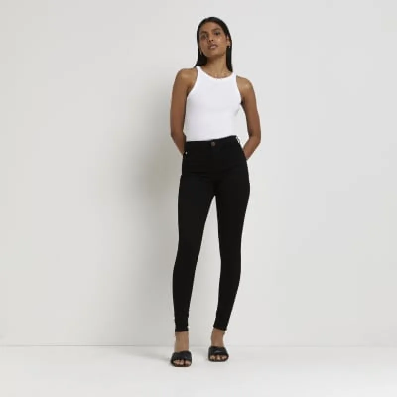 Black Molly Mid Rise Black Skinny Jeans sold by River Island