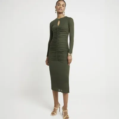Khaki ruched cut out bodycon midi dress sold by River Island