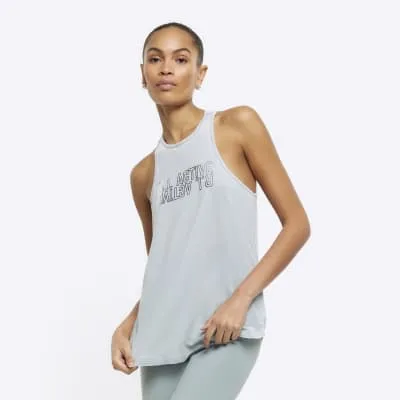 Green foil graphic tank top sold by River Island