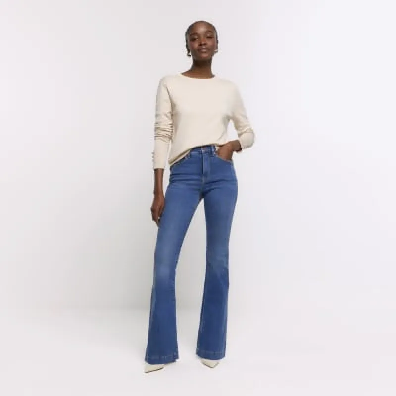 Blue high waisted tummy hold flare jeans sold by River Island