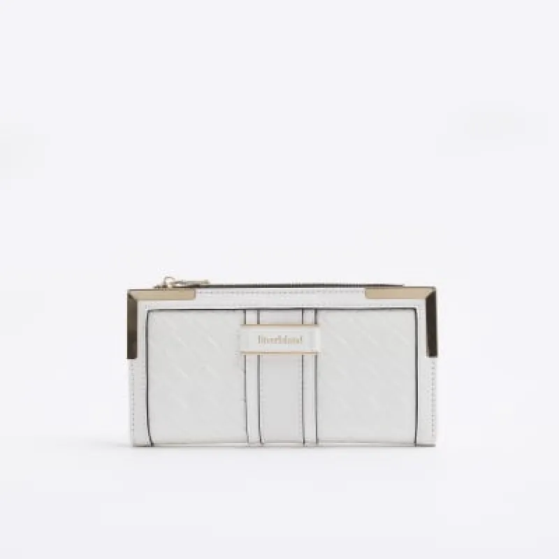 White embossed weave purse sold by River Island