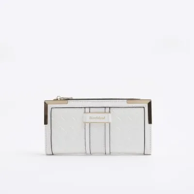 White embossed weave purse sold by River Island